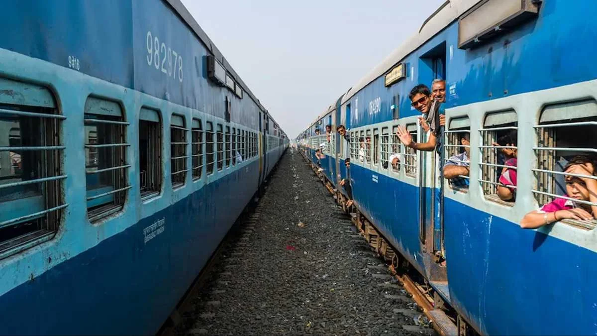 Indian Railways two blue trains going parallel